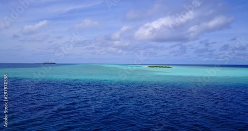 More than 20 motu (small islands) are sprinkled around the lagoon, and the small island of Tapuaetai, Tahiti photo