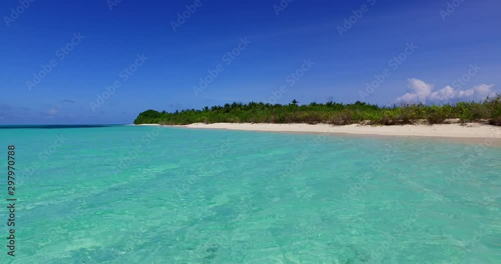 Picturesque landscape with reflecting crystal clear water of the tropical emerald lagoon near a low-lying tropical island in Jamaica Picturesque landscape with reflecting crystal clear water of the tropical emerald lagoon near a low-lying tropical island in Jamaica