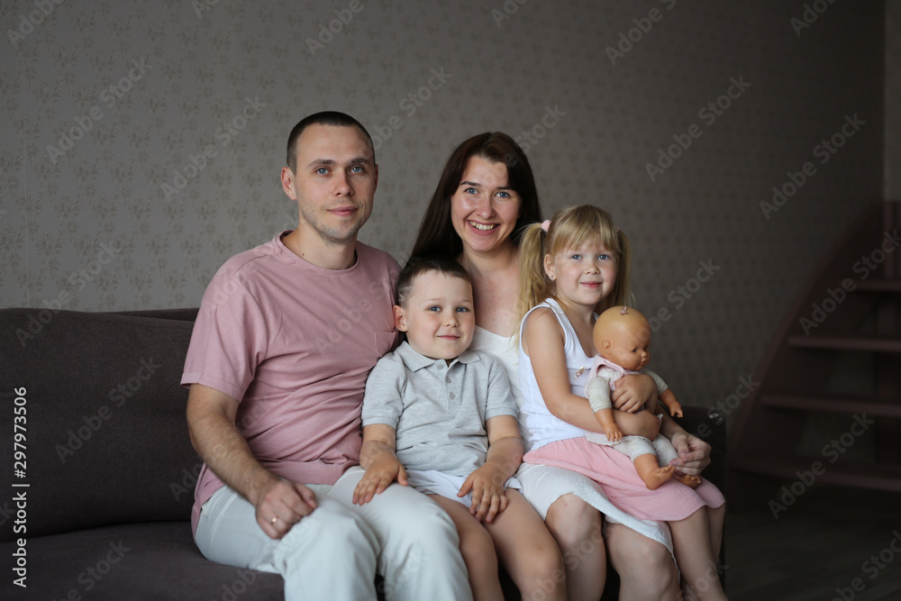 An ordinary Caucasian family with two siblings An ordinary Caucasian family with two siblings