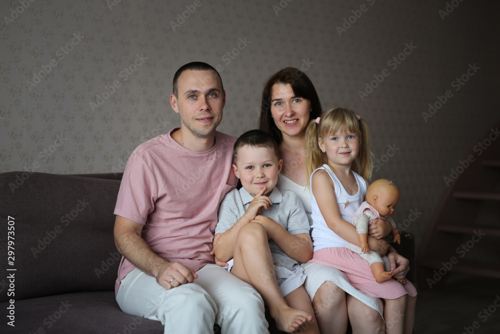 An ordinary Caucasian family with two siblings An ordinary Caucasian family with two siblings