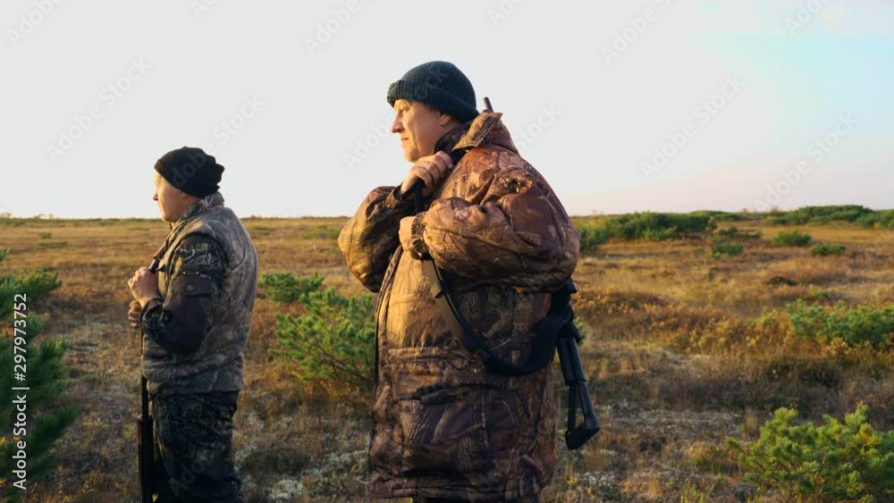 hunters hide behind a cedar bush are called ducks, geese hunters hide behind a cedar bush are called ducks, geese