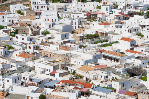 Restaurants on roofs on the houses in historic center of Lindos, Greece © Alex White