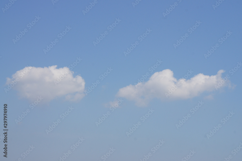 the blue sky and white clouds are striking the blue sky and white clouds are striking