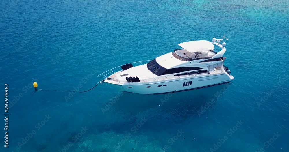 360 rotate view of white yacht anchored on shallow waters of turquoise lagoon in Mexico 360 rotate view of white yacht anchored on shallow waters of turquoise lagoon in Mexico