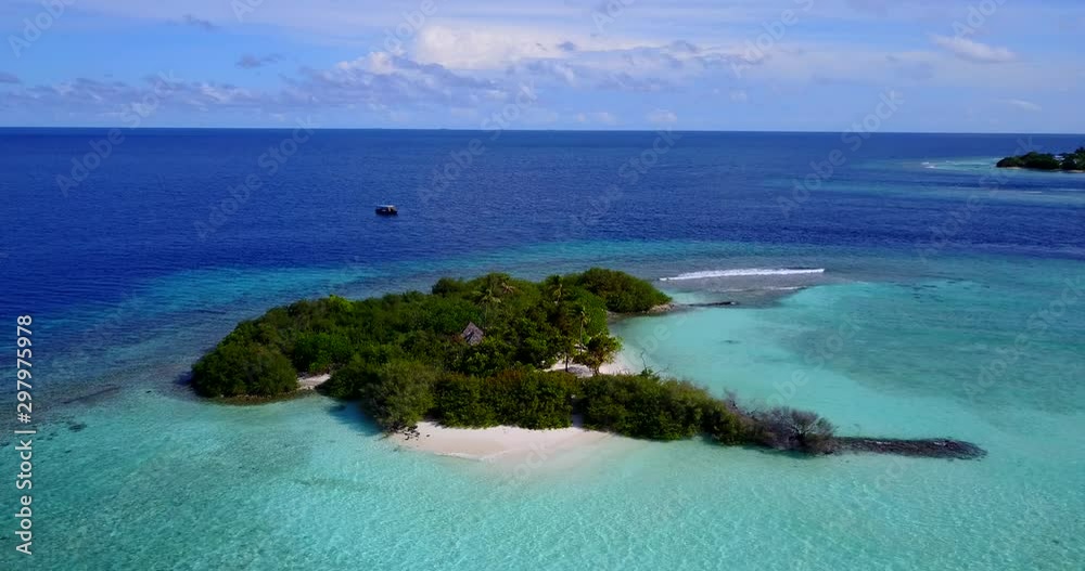 Tourists taking a break at tropical Islands in the middle of blue Indonesian sea by swimming, diving or just relaxing Tourists taking a break at tropical Islands in the middle of blue Indonesian sea by swimming, diving or just relaxing