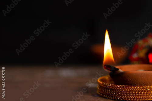 Happy diwali / karthigai deepam - Hindus religious festival - Candle flame close-up