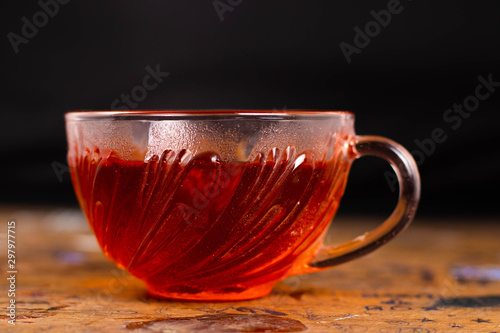 Cup of Black tea isolated on black - Vintage cup with