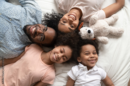 Top view portrait of happy black family with kids