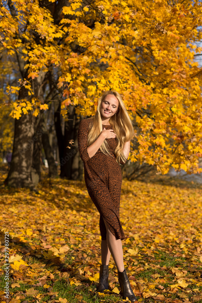 Model at autumn in park