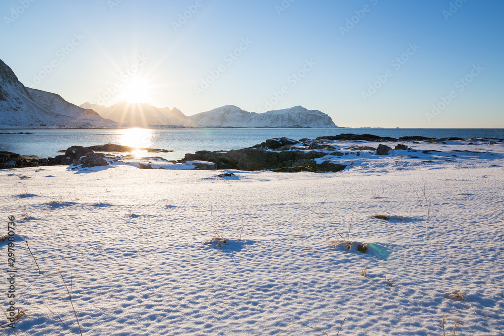 Fototapeta premium Evening mood at beautiful beach on Lofoten islands in winter