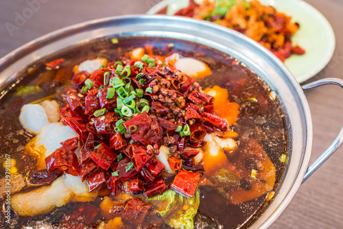 Asia, China food. Szechuan water boiled spicy fresh fish. Fried Chicken side dish. Chengdu Chongqing hotpot food culinary.
