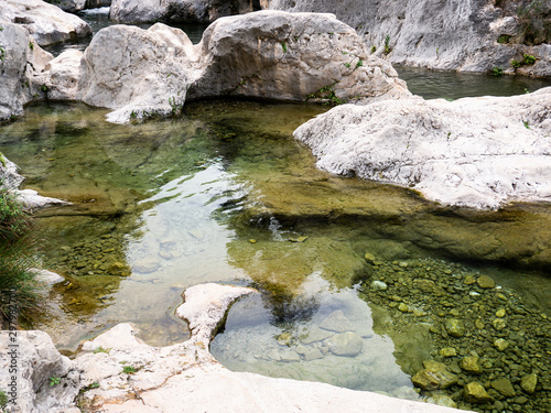  stones and meltwater in the pou clar pools of Onteniente