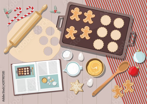 Bakery background with ingredients for cooking christmas baking. Sugar, eggs and spices on kitchen table,top view.