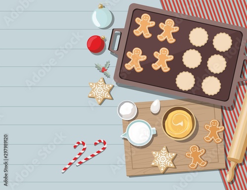 Cookies with ingredients for cooking christmas baking. Sugar, eggs and spices on kitchen table,top view. 