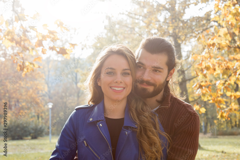 Couple in the park enjoying nice autumn time. Couple in the park enjoying nice autumn time.