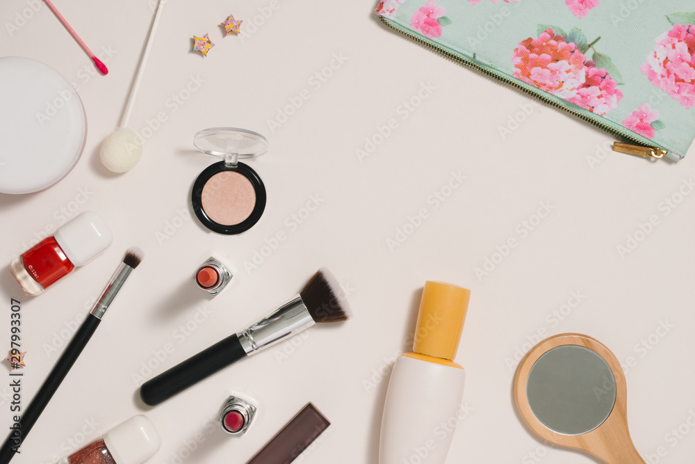 Make up bag with cosmetics on color background Make up bag with cosmetics on color background
