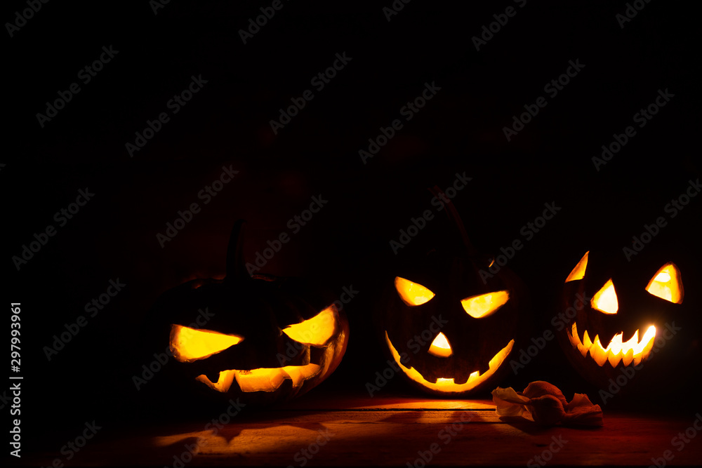 Halloween pumpkin head jack lantern in dark background Halloween pumpkin head jack lantern in dark background