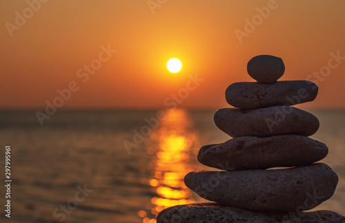 Zen concept. Sunset. The object of the stones on the beach at sunset. Relax   Meditation.