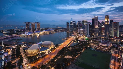 Singapore business district and city - Time lapse from sunset to night