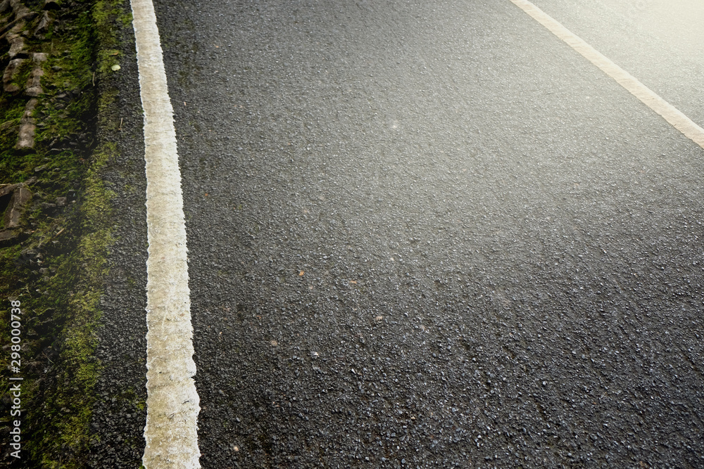 Fototapeta premium New asphalt texture with white line on road