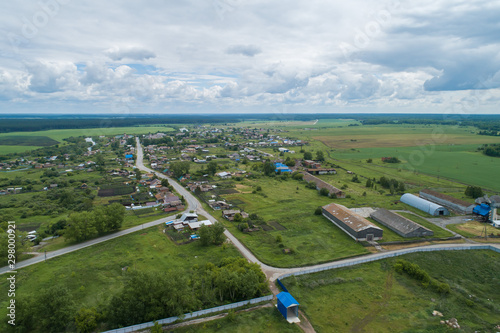 Small village, three roads, aerial view. Summer, cloudy. Russia, Filatovskoe