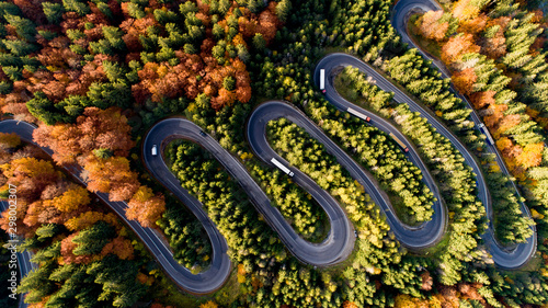 Colourful landscape aerial view of highway, cars, trees with yellow and orange leaves. Europe roads details © aboutmomentsimages