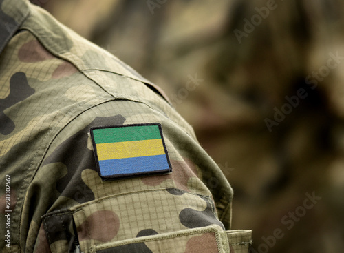 Flag of Gabonese on military uniform. Army, troops, soldiers, Africa,(collage).