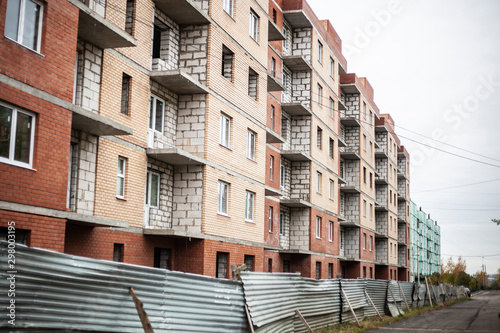 The construction of an apartment building. Unfinished house in Russia. Deceived equity holders. The construction of a residential building. © Олег Копьёв