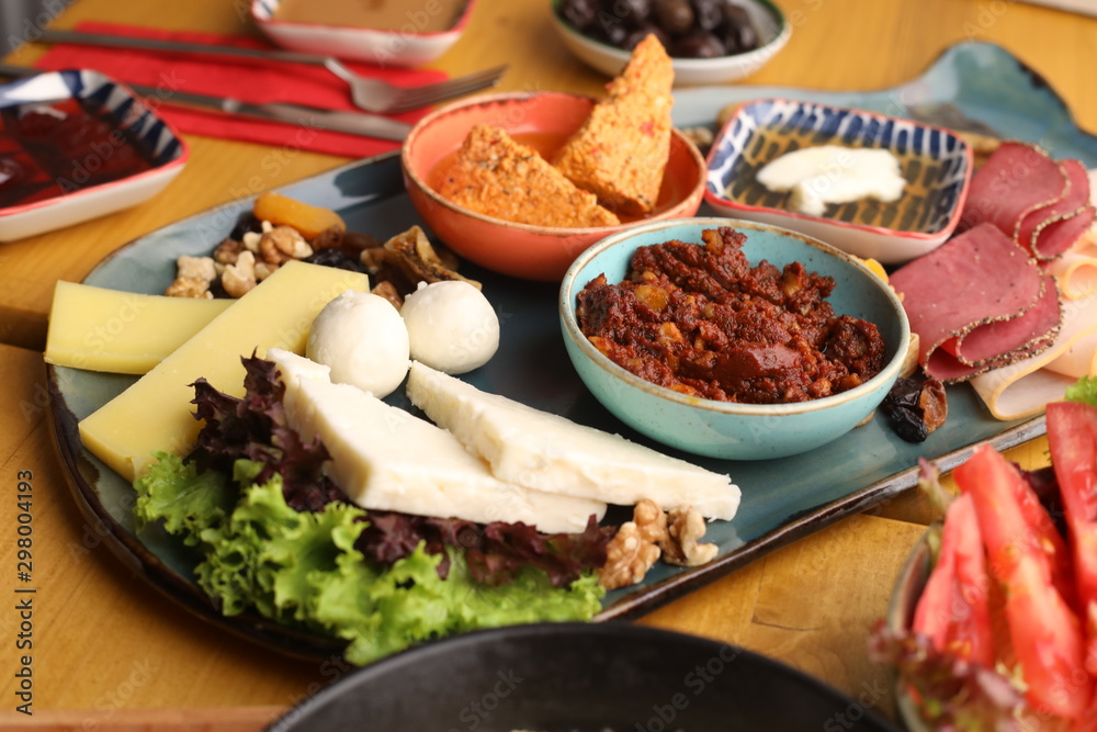 Turkish breakfast with salami honey and butter