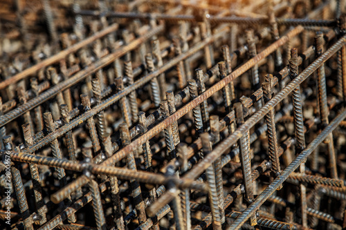 Industrial background. Preparation for pouring concrete. Construction of buildings of reinforced concrete.steel reinforcement bar texture in construction site,Closeup of Steel rebars © bukhta79