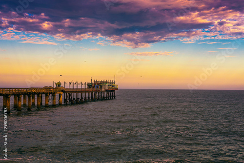 Sunset over the old historic jetty in Swakopmund  Namibia