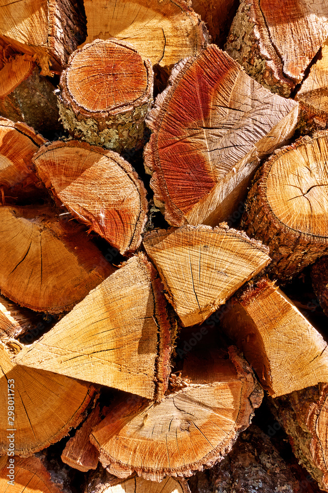 Firewood - Stack of chopped wood logs Firewood - Stack of chopped wood logs