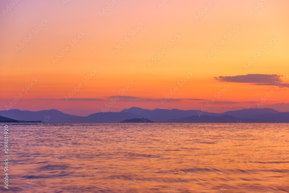 Sunset over the sea and islands