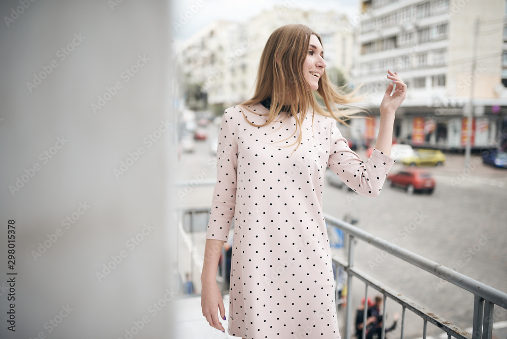 young woman in blue dress