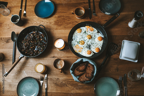 Fried egss and plates for breakfast photo