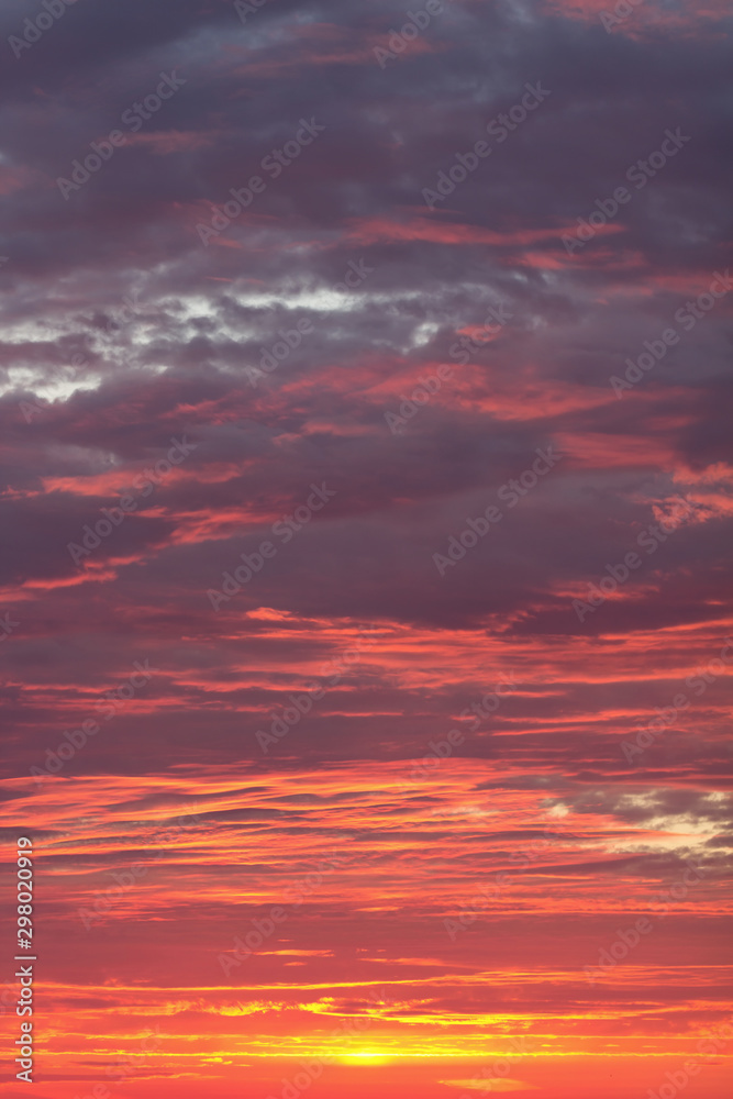 Bright dramatic sky with clouds during sunrise or sunset