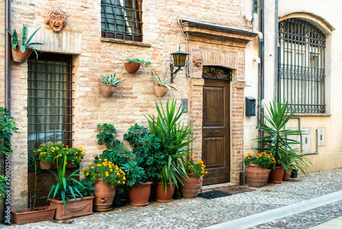 Old buildings on small italian street. Narrow street in Italy.