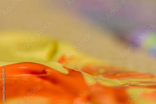 abstract background with acrylic colors, yellow and orange backdrop, textured template design, defocused image with copy space 