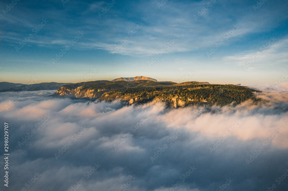 sea of Fog in mountains before sunrise in austrian alps