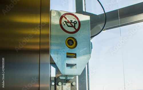 Elevator control unit with a sign.