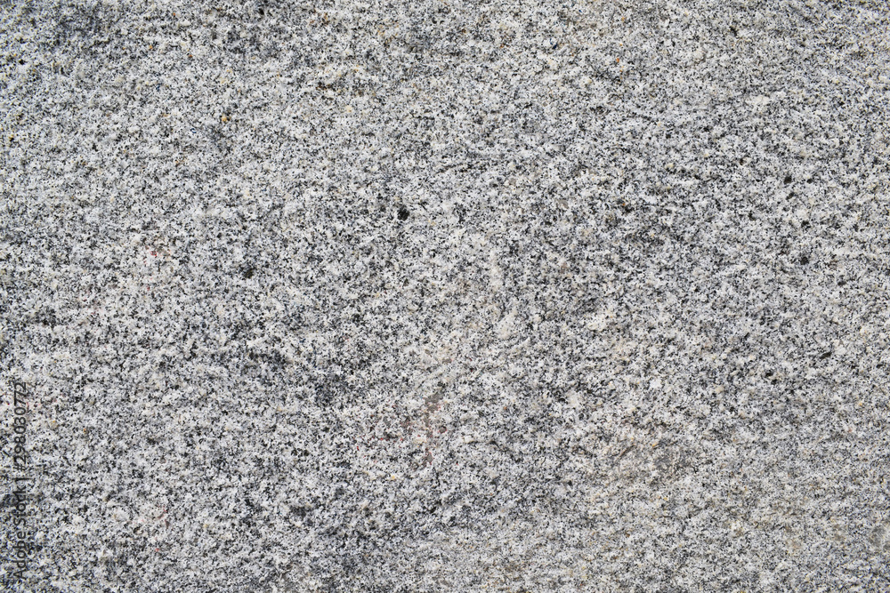 the texture of the stone is small, white with black dots. the texture of the stone is small, white with black dots.