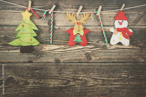 Christmas decor Over Rustic Wood Background