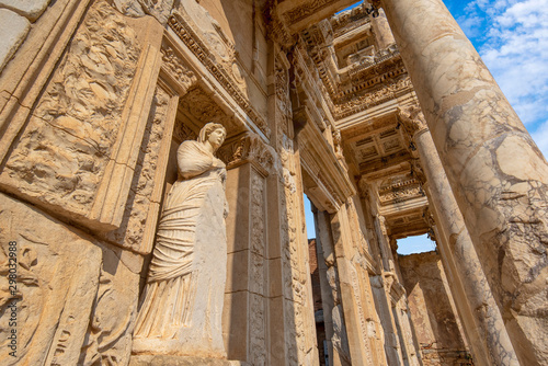 Library of Celsus and sculpture in the ancient city of Ephesus, Selcuk Izmir, Turkey. The UNESCO World Heritage site was is an ancient Roman building on the coast of Ionia in honour of Tiberius. Efes