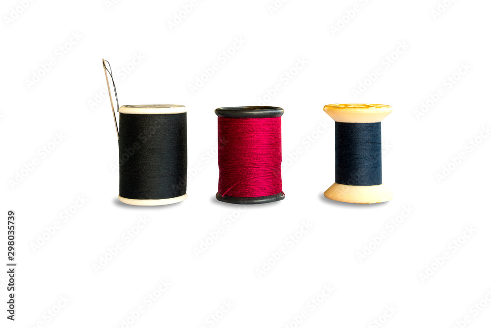 Black,red ,blue thread and needle isolated on white background Black,red ,blue thread and needle isolated on white background