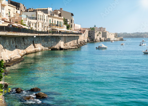 View of the seaside in the old city of Ortigia (part of the city of Siracusa, Italy, Sicily).