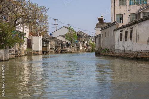 Navigating on Shantang Canal between ancient houses
