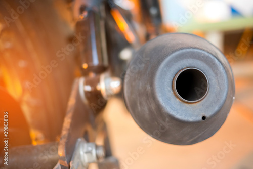 close up vintage motorcycle Parts with sunlight on blur background. Photo select focus