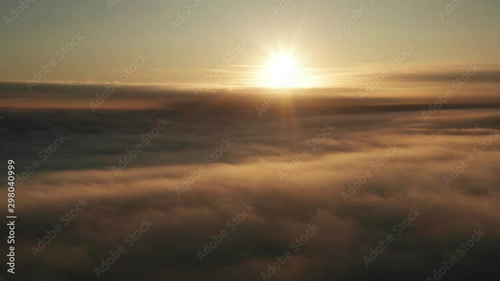 Sunrise aerial view over clouds for magnificent scene Sunrise aerial view over clouds for magnificent scene