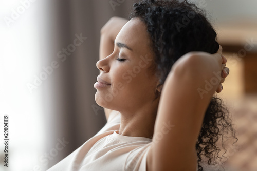 Fotografie, Obraz Close up of calm black woman relax with eyes closed