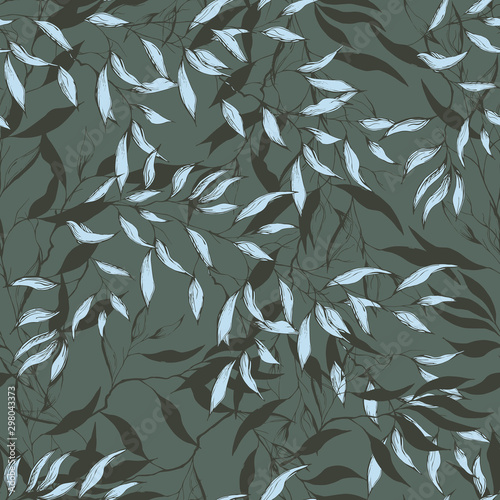 Seamless floral pattern. Ornament of leaves on a green background. Endless textile ornament for fabrics, tiles and paper and wallpaper on the wall.